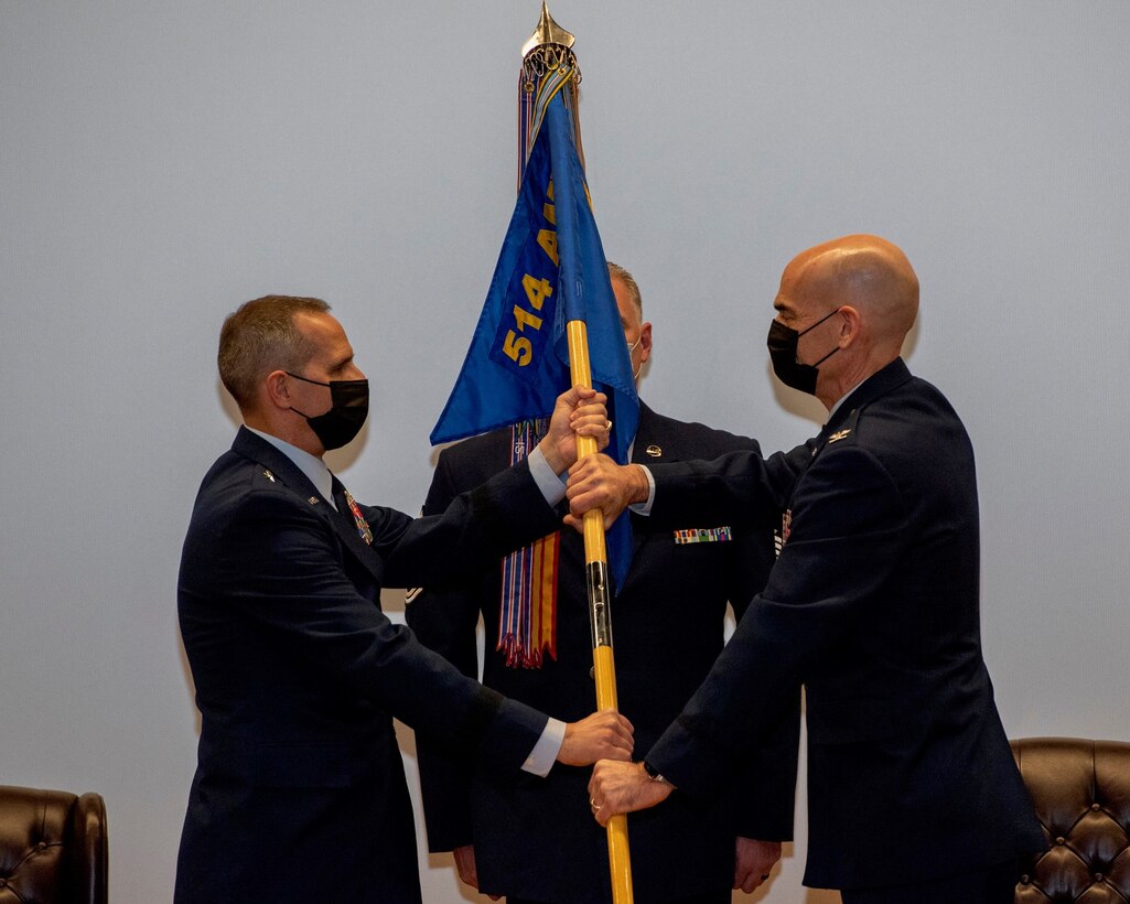 U.S. Air Force Col. William Gutermuth, left, takes command of the 514th Air Mobility Wing March 6, 2021. Gutermuth, formerly the commander of the 514th Operations Group, is the 27th commander in the wing's history. (U.S. Air Force photo by Staff Sgt. Sean Evans)