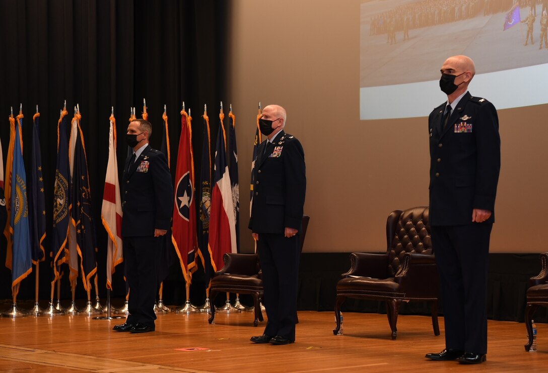 Pemberton, outgoing 514th Air Mobility Wing Commander, center, and incoming 514th Air Mobility Wing Commander, U.S. Air Force Col. William Gutermuth, right, during a change of command ceremony March 6, 2021. Gutermuth, formerly the commander of the 514th Operations Group, is the 27th commander in the history of the Freedom Wing. (U.S. Air Force photo by Tech. Sgt. Luther Mitchell)