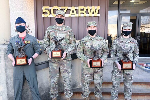 Airman holding award
