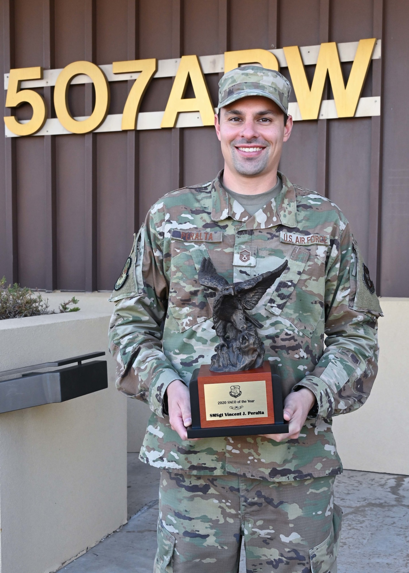Airman holding award