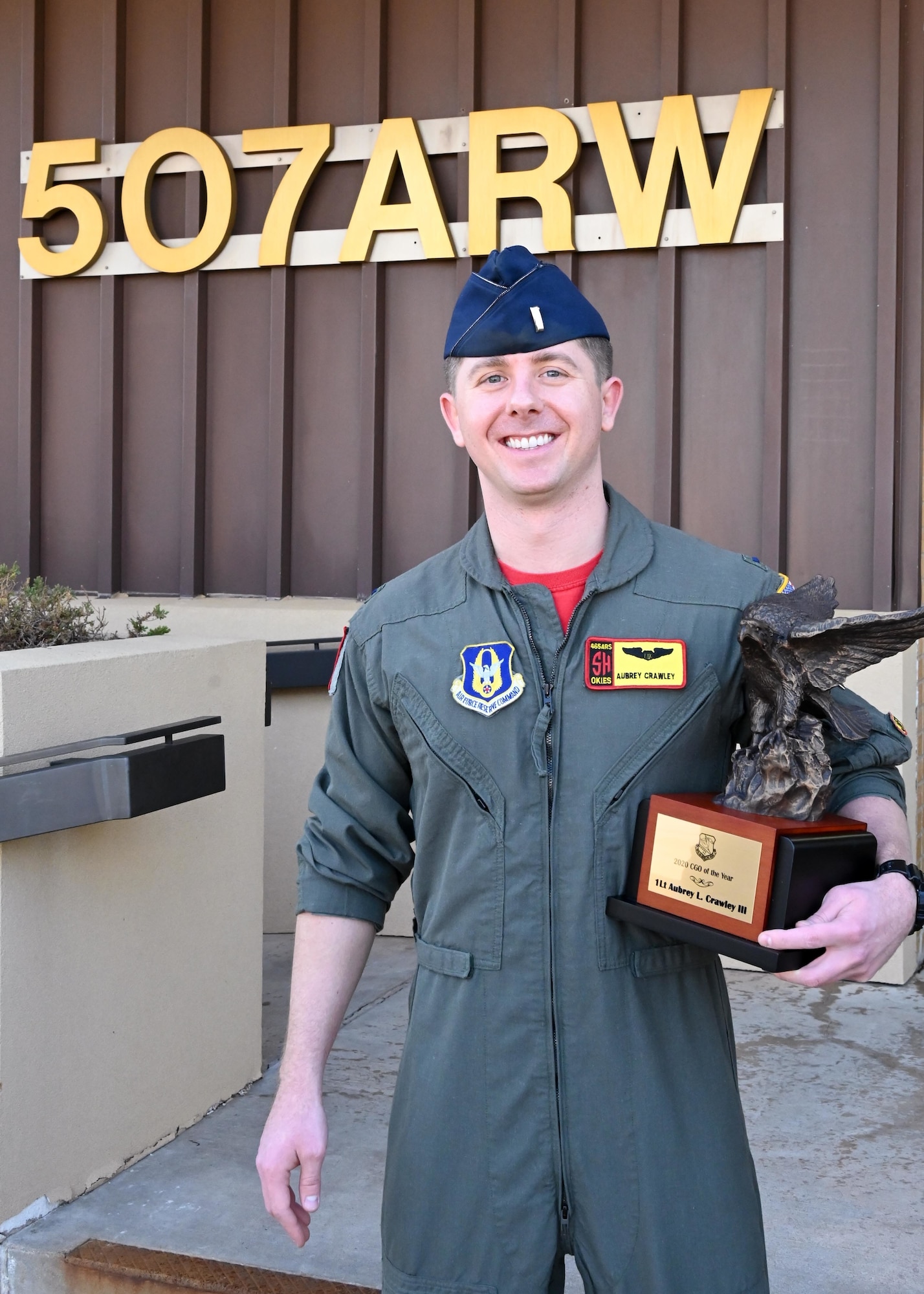 Airman holding award