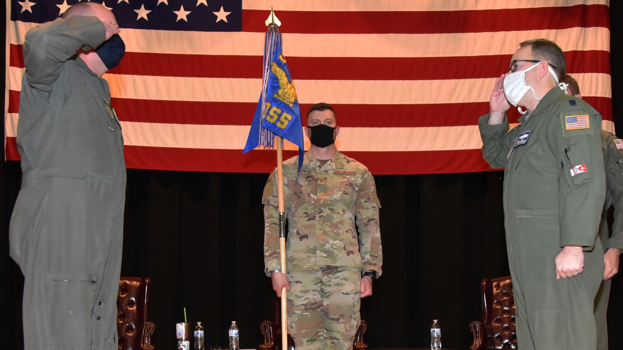 Lt. Col. Matthew Ghormley, right, relinquishes command of the 931st Operations Support Squadron during a change of command ceremony March 6, 2021, at McConnell Air Force Base, Kansas.