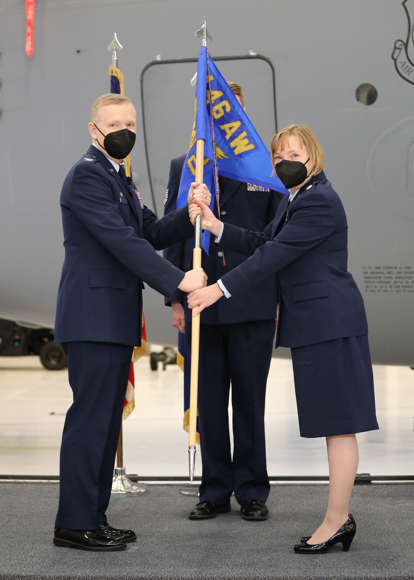 U.S. Air Force Lt. Col. Cynthia Welch assumes command of the 446th Operations Group from Col. Paul Skipworth, commander of the 446th Airlift Wing on March 6, 2021 at Joint Base Lewis-McChord, Washington.