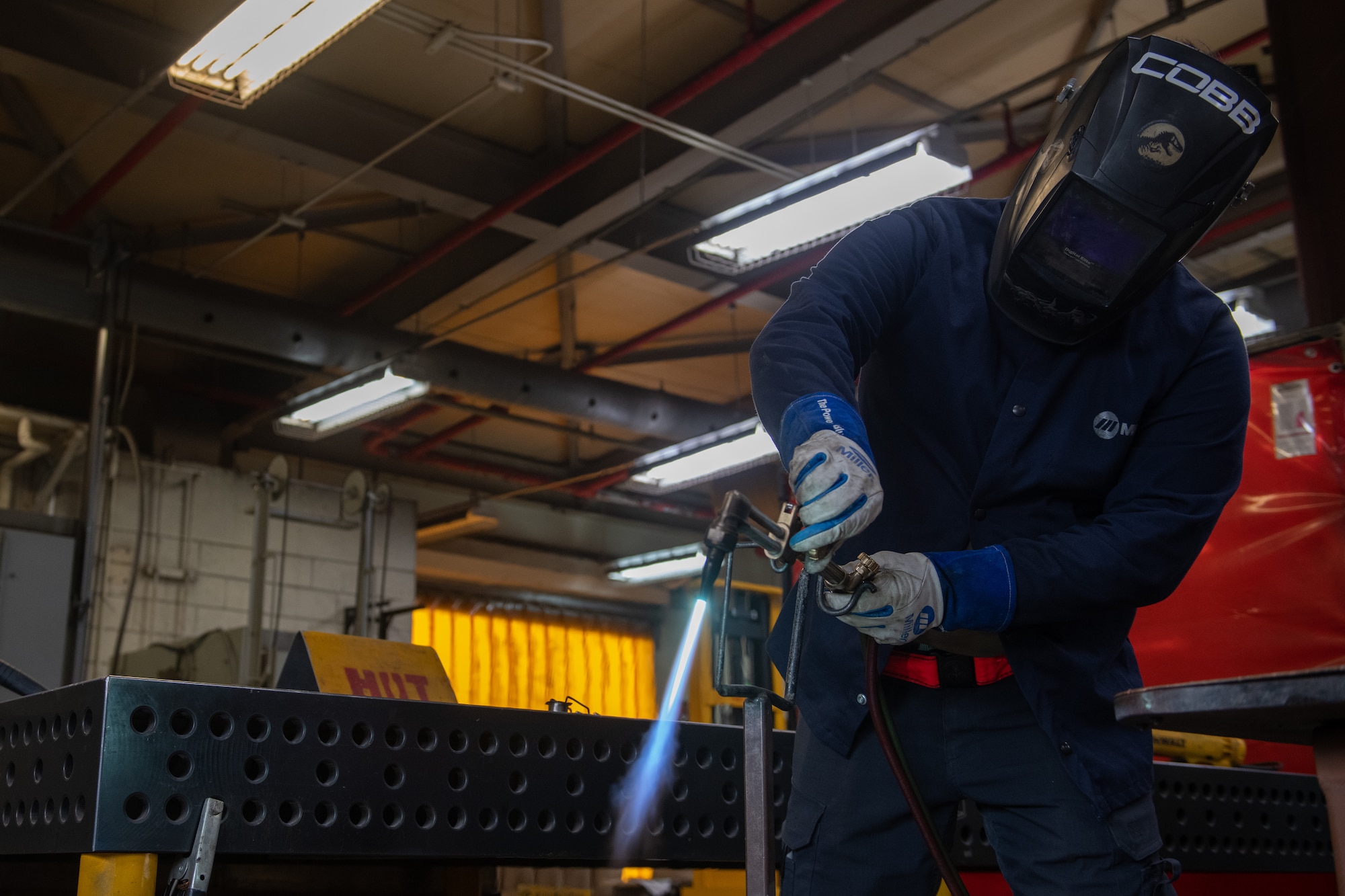 Airman conducts welding practice.