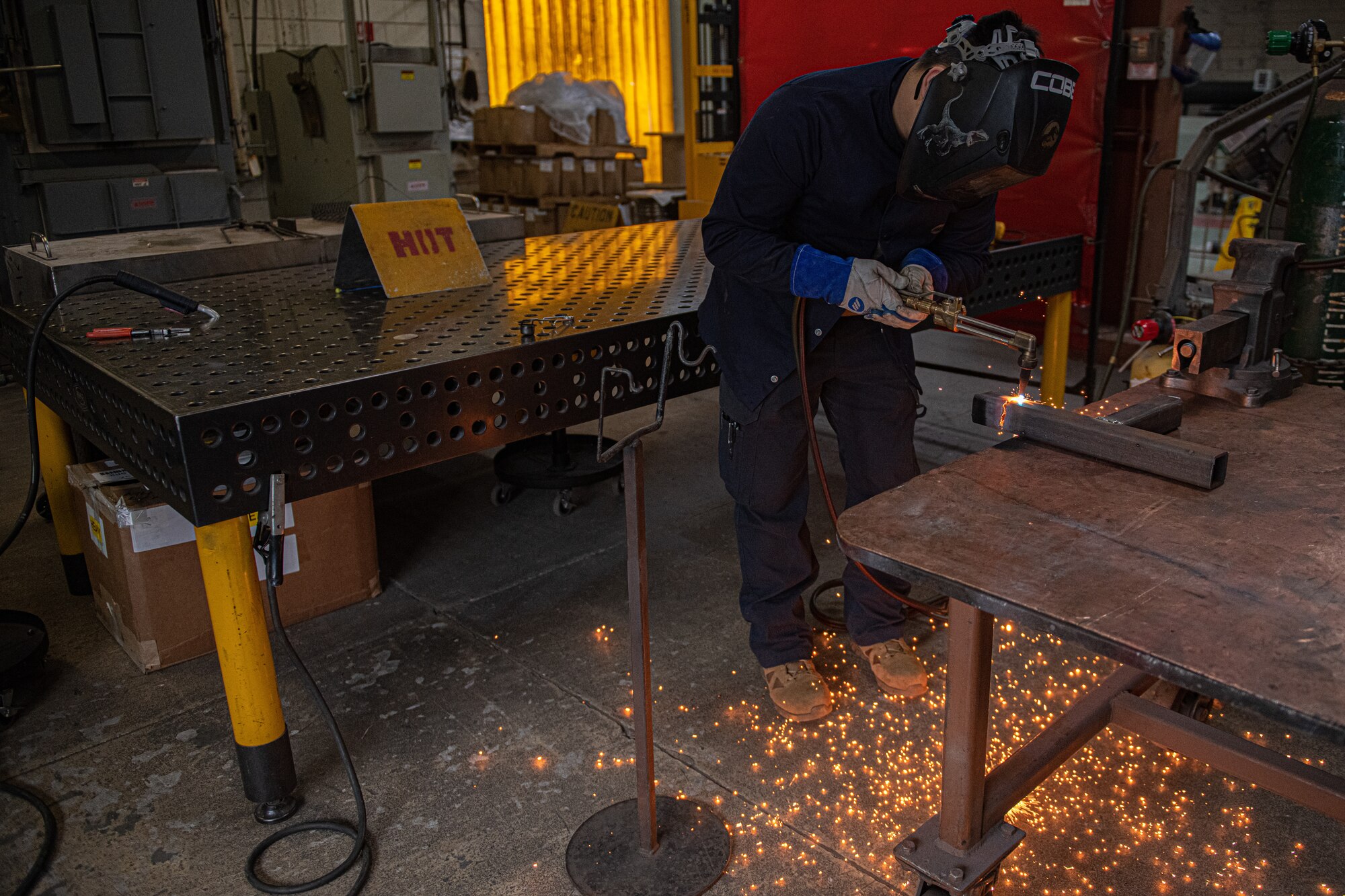 Airman conducts welding practice.