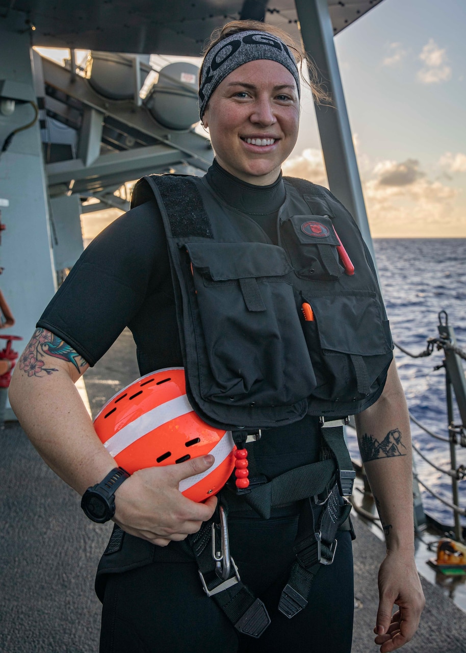 PHILIPPINE SEA (March 5, 2021) - Operations Specialist 3rd Class Jenny Fuentes, from Montrose, Colo., poses for a photograph wearing her search and rescue swimmer (SAR) gear. SAR swimmers are vital to the readiness of U.S. Navy ships and serve aboard all units underway.