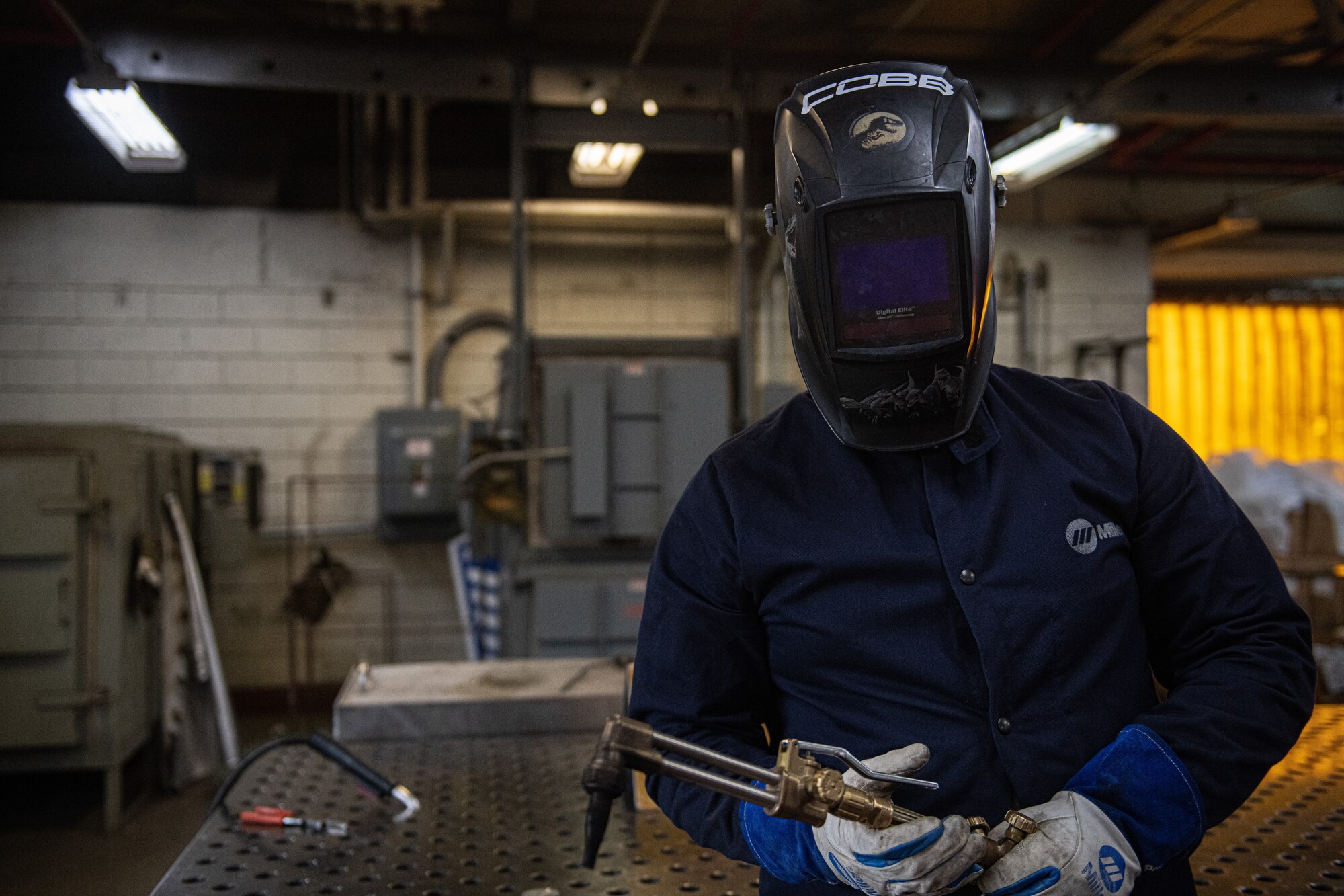 Airman conducts welding practice.