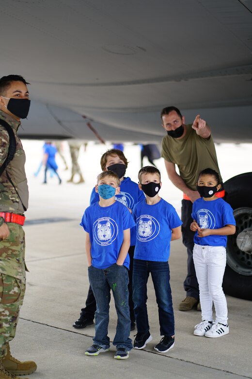 Maintainers assigned to the 351st Expeditionary Air Refueling Squadron speak with elementary and middle school students during a KC-135 Stratotanker aircraft tour, at Morón Air Base, Spain, Feb. 26, 2021. The tour enabled the 351st EARS to showcase KC-135 capabilities and highlight the Airmen who ensure Operation Juniper Micron success. (Courtesy Photo)