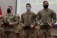 (Left to right) Staff Sgt. Dylan Pitetti, winner of the Noncommissioned Officer of the Year; Spc. Derek Knoll, winner of the Soldier of the Year; and Staff Sgt. Trevor Howard, winner of the Command Sgt. Maj. Jay H. Field NCO Leadership Award, pose with their awards for the Pennsylvania Army National Guard’s Best Warrior Competition on March 6, 2021, at Fort Indiantown Gap, Pa.