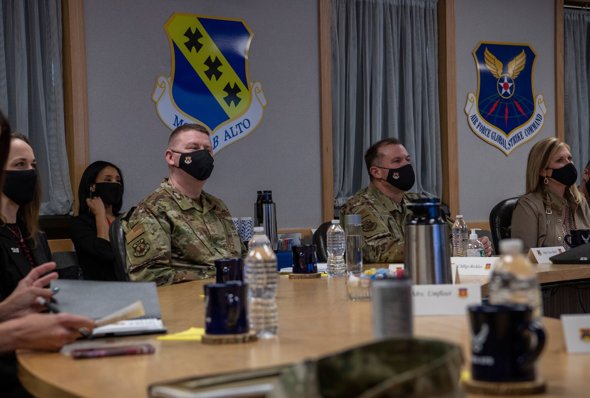 Maj. Gen. Thad Bibb, 18th Air Force commander, right, and Chief Master Sgt. Chad Bickley, 18th AF command chief, left, are briefed on Team Dyess’ missions at Dyess Air Force Base, Texas, Mar. 3, 2021