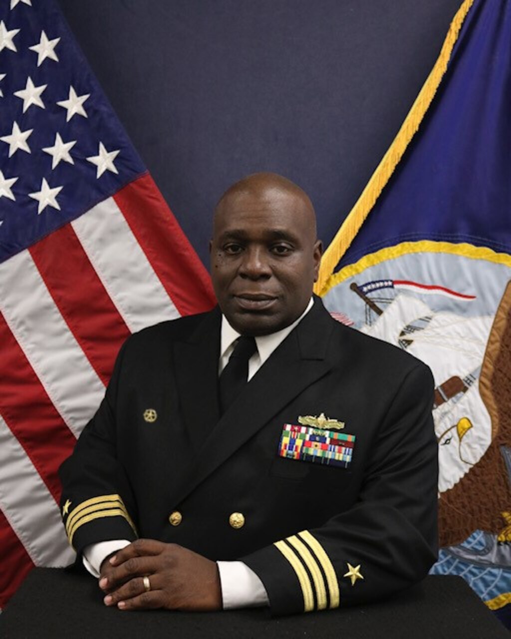 Studio portrait of Cmdr. Corey Odom