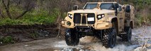 A Joint Light Tactical Vehicle displays its overall capabilities during a live demonstration at the School of Infantry West, Marine Corps Base Camp Pendleton, California, Feb. 27, 2019. The JLTV consists of multiple platforms capable of completing a variety of missions while providing increased protection and mobility for personnel across the Marine Corps. (Official Marine Corps photo by Sgt. Timothy R. Smithers/Released)