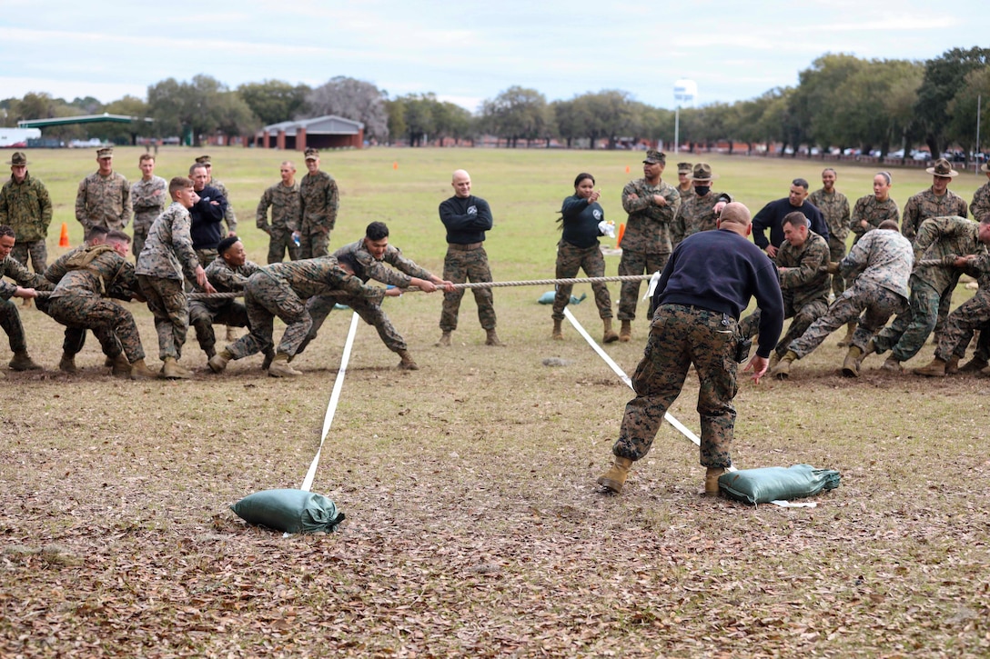 Marines compete in a tug of war competition.