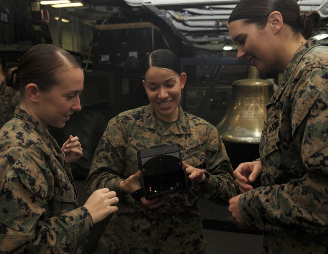 Marines with the 22nd Marine Expeditionary Unit Female Engagement Team analyze data compiled using the SEEK- II during FET training aboard the USS Kearsarge (LHD 3), Jan. 2, 2018.