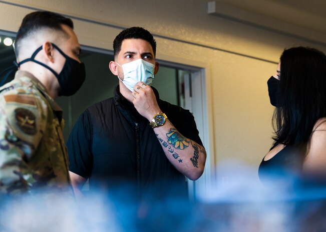 People talking in a Tattoo Shop