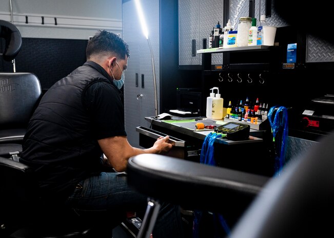 People talking in a Tattoo Shop