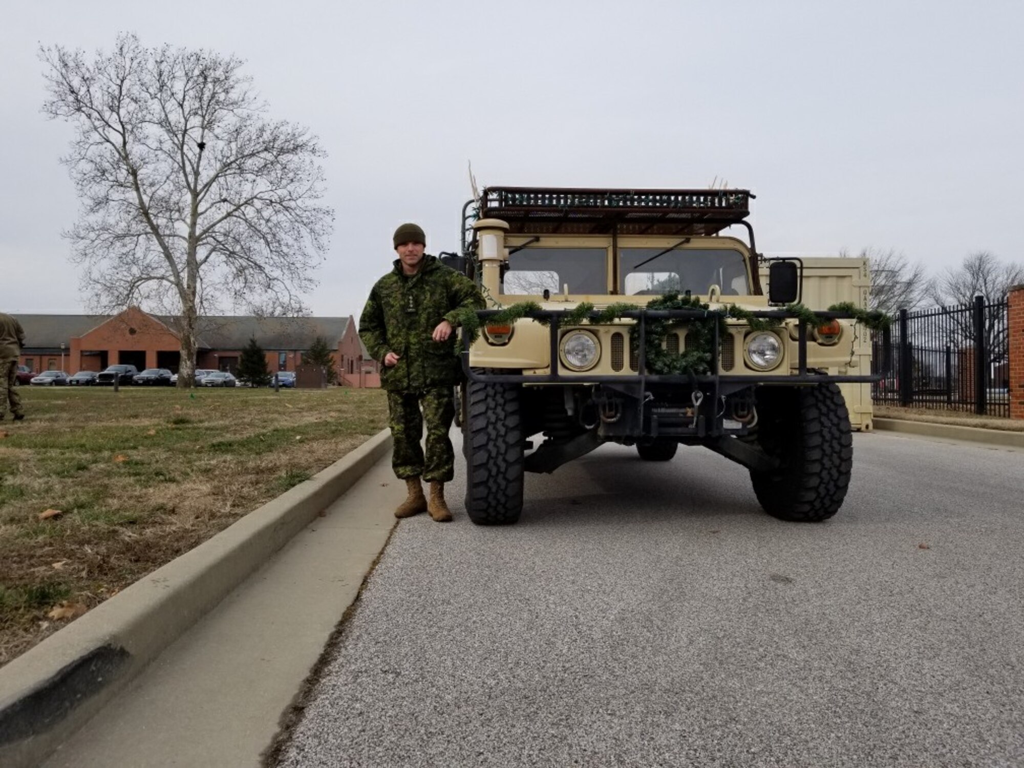 Capt. Patrick Rodrigue, shown here as a volunteer in a Christmas parade through the base, is a Canadian Flight Nursing officer on exchange with 375th Aeromedical Evacuation Squadron since 2018.