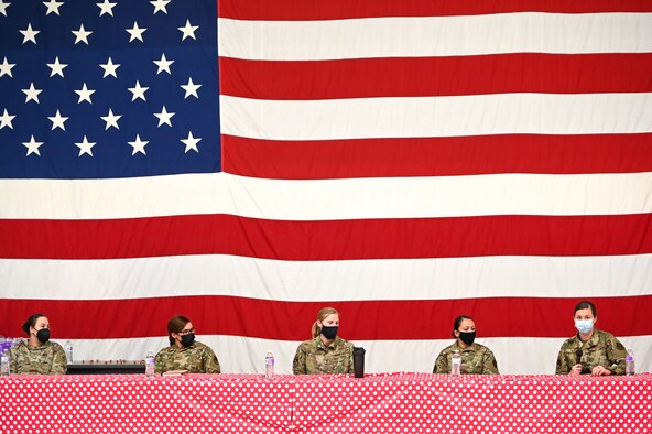 1st Lt. Michela Infantino and 2nd Lt. Kassidi Nudd (right), both reservists in the 419th Fighter Wing, speak alongside other women at Hill Air Force Base, Utah, for an International Women's Day panel, March 8, 2021