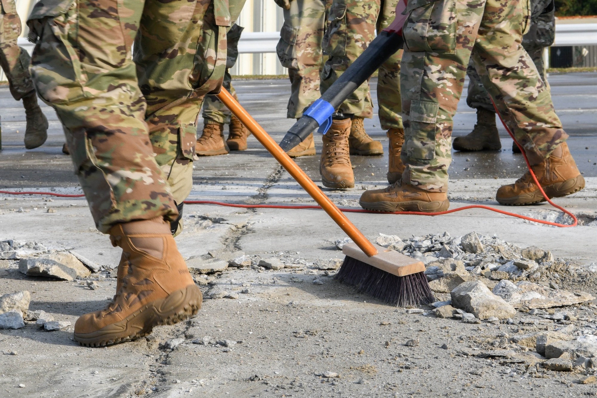 Airmen practicing spall repair