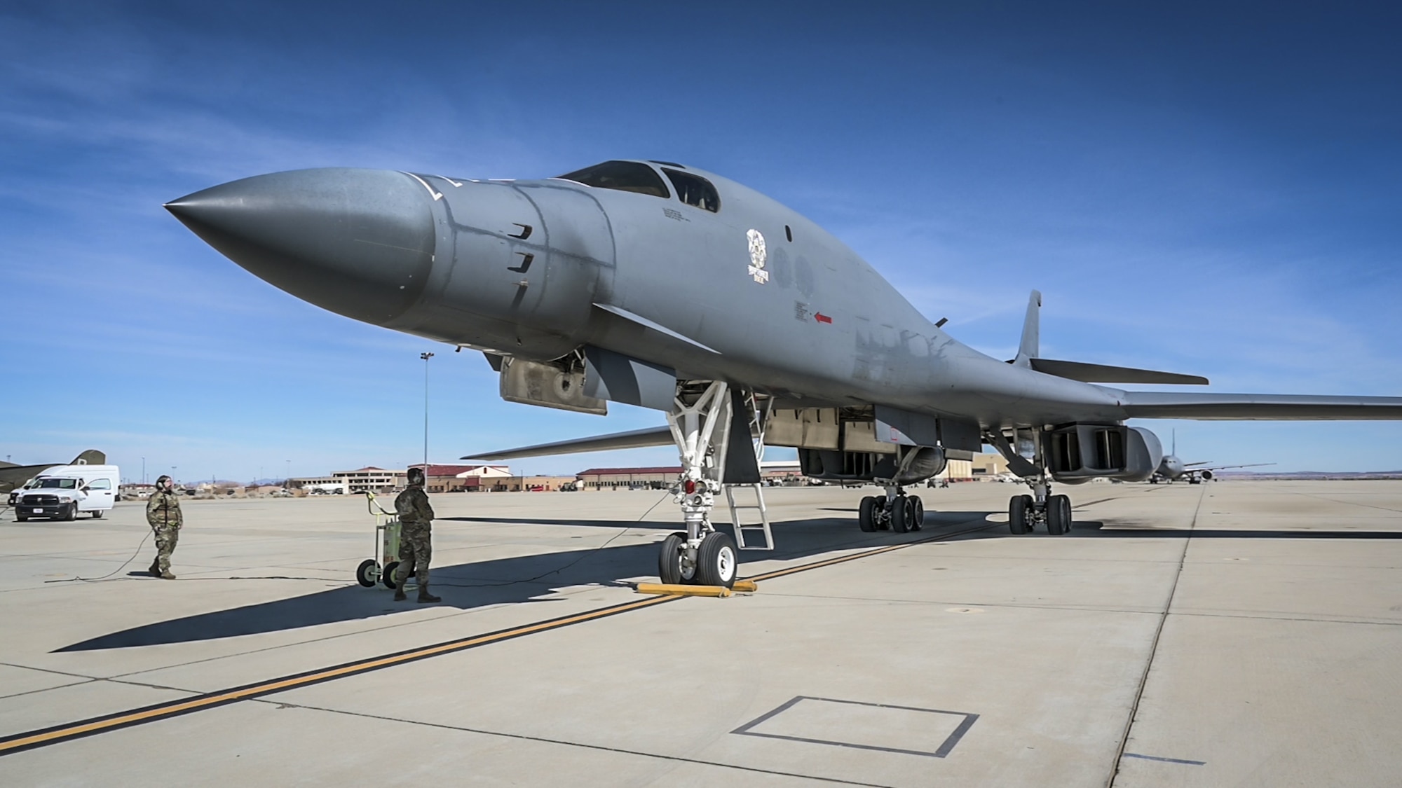 A recently retired B-1B Lancer, tail number 86-0099, begins to off-load its crew at Edwards Air Force Base, California, Feb. 23. The aircraft will become the Edwards Aircraft Ground Integration Lab, or EAGIL, a non-flyable aircraft that will be used as an integration lab for future upgrades. (Air Force photo by Giancarlo Casem)