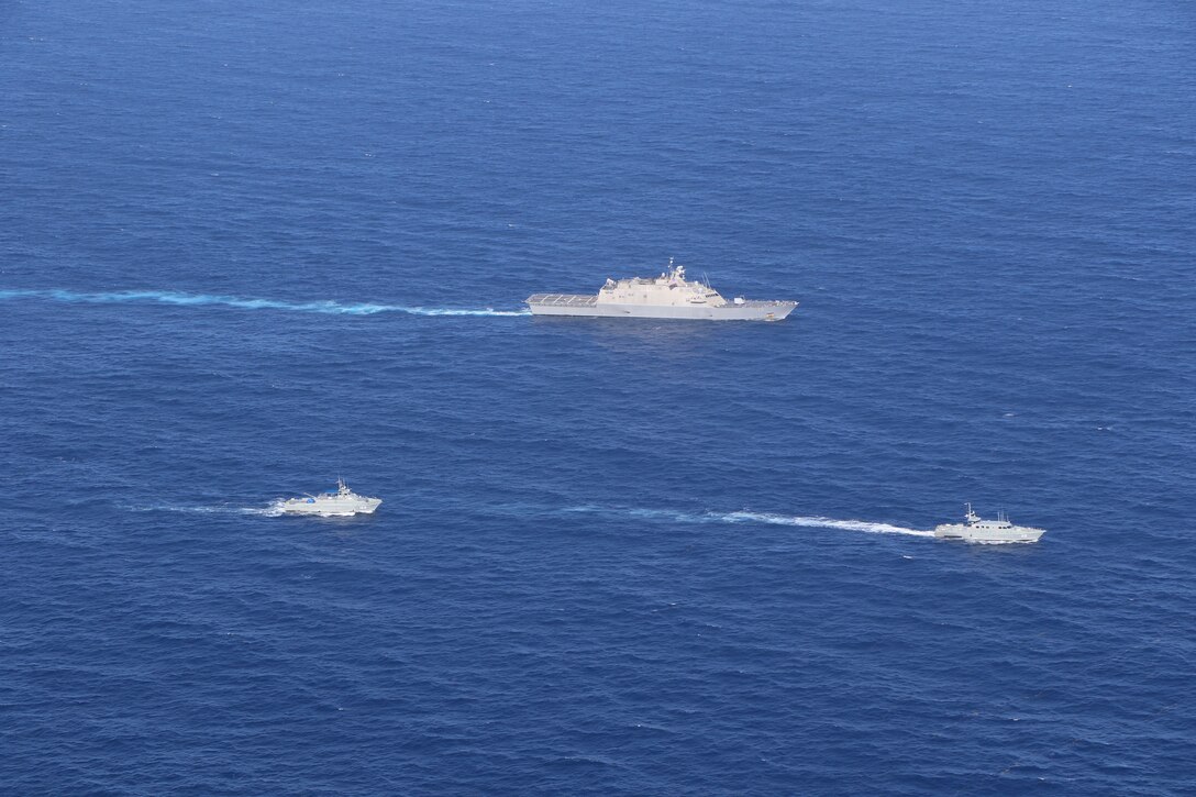 USS Wichita (LCS 13) executes a passing exercise (PASSEX) with Dominican Republic patrol boats Orion (GC 109) and Altair (GC 112) while operating in the Caribbean Sea, March 2, 2021.