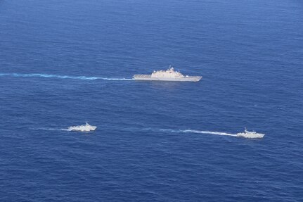 USS Wichita (LCS 13) executes a passing exercise (PASSEX) with Dominican Republic patrol boats Orion (GC 109) and Altair (GC 112) while operating in the Caribbean Sea, March 2, 2021.