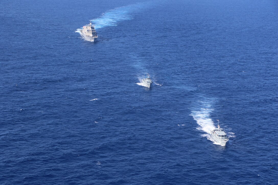 USS Wichita (LCS 13) executes a passing exercise (PASSEX) with Dominican Republic patrol boats Orion (GC 109) and Altair (GC 112) while operating in the Caribbean Sea, March 2, 2021.