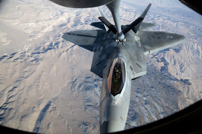 A F-22 Raptor from the 422nd Test and Evaluation Squadron at Nellis Air Force Base, Nevada, refuels during Orange Flag, March 2, 2021. Orange Flag, the large force test event carried out three times annually by Air Force Test Center's 412th Test Wing at Edwards AFB, Calif., combined with the 53rd Wing's Black Flag, brought several firsts for the test community March 2-4.