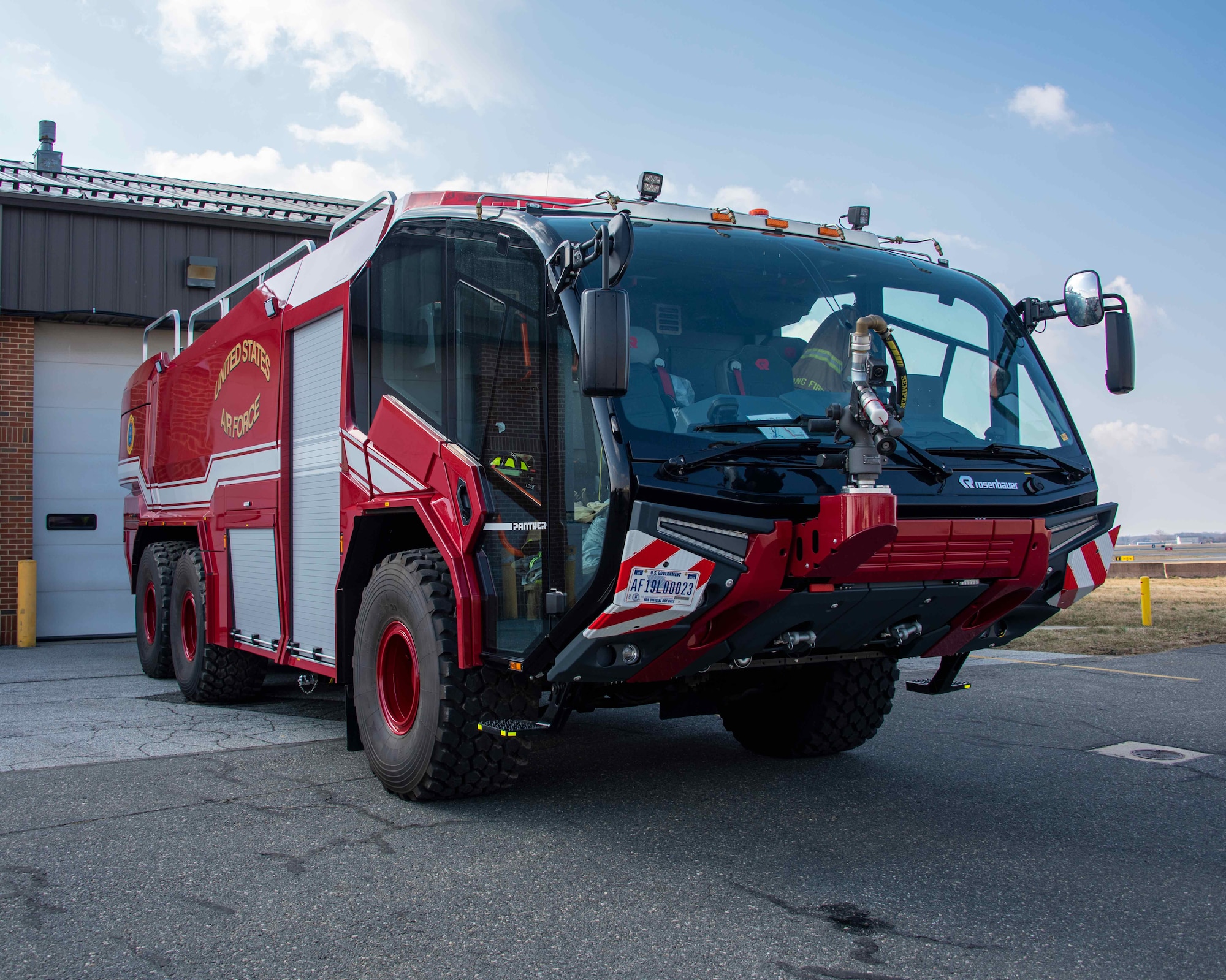 NEW CASTLE AIR NATIONAL GUARD BASE, Del.—Station 33’s new Rosenbauer Panther P-23 crash truck is parked outside of its bay on 4-March-2021. The new truck greatly expands the capability of the fire station to respond to airfield emergencies. (U.S. Air National Guard photo by A1C Brandan Hollis)