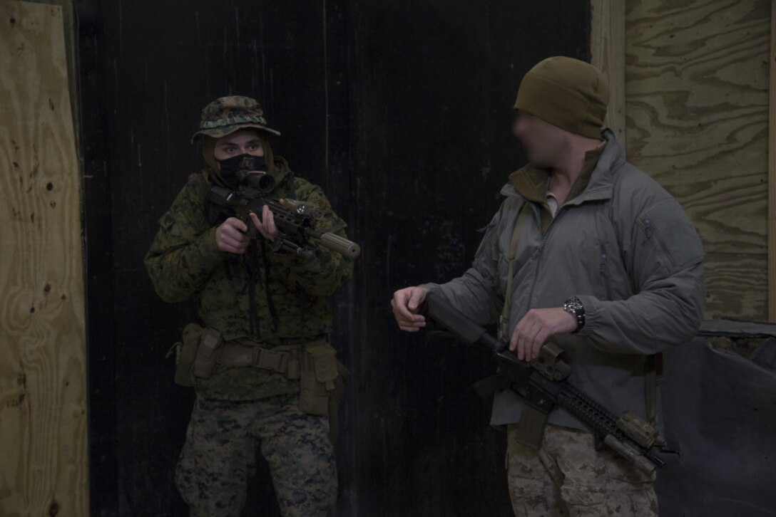 Marine Raiders with 3rd Marine Raider Battalion train Marines with 1st Battalion, 8th Marines on close quarters battles tactics at Camp Lejeune, N.C., Jan. 28, 2021