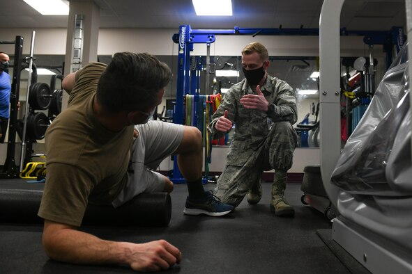 Tech. Sgt. David Ferricher, 22nd Maintenance Squadron metals technician, attends a foam rolling class Mar. 3, 2021, at McConnell Air Force Base, Kansas. The physical therapy clinic at McConnell offers Airmen the opportunity to attend a free foam rolling class every Tuesday at 2:00 p.m. (U.S. Air Force photo by Senior Airman Nilsa Garcia)