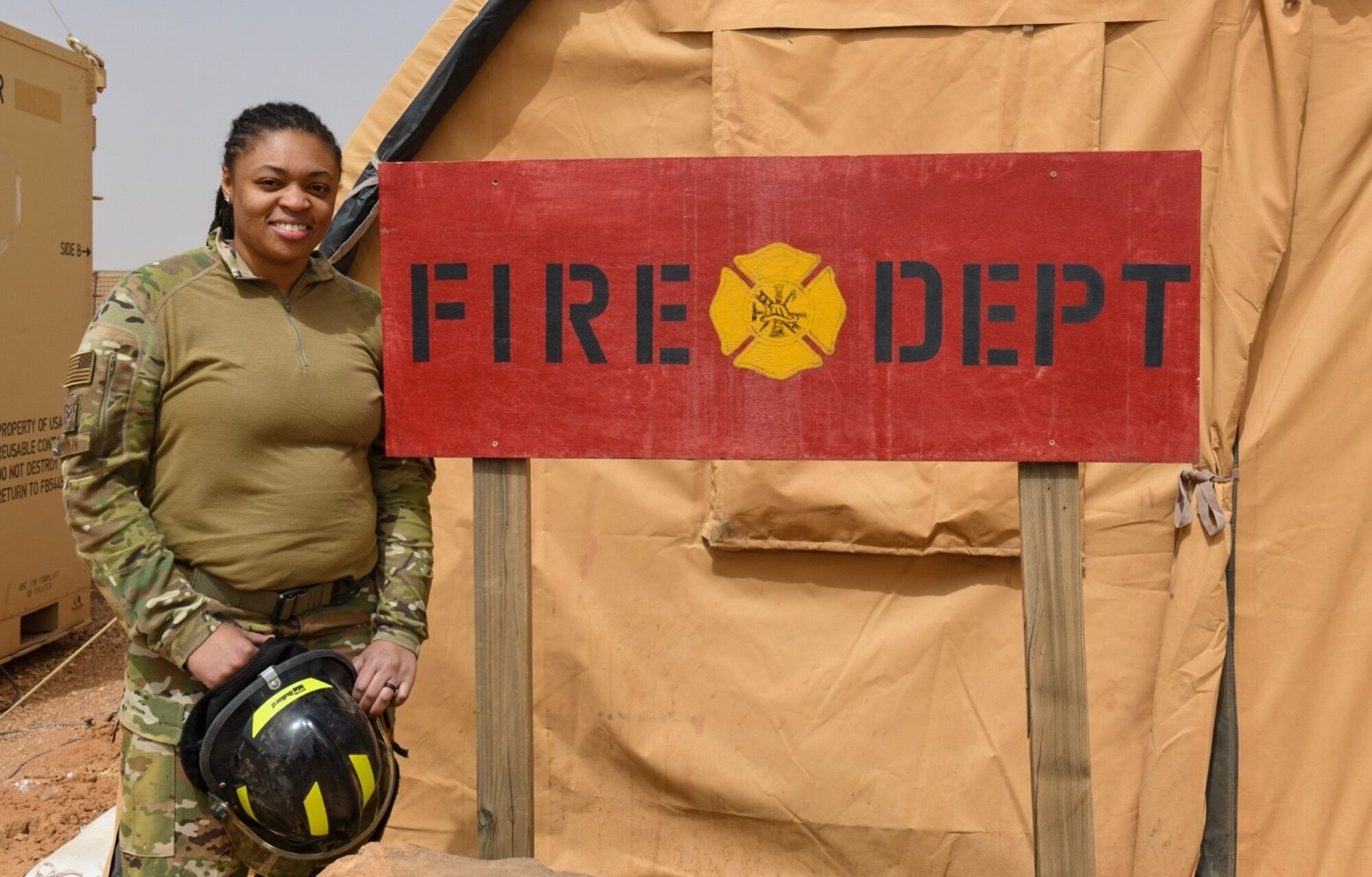 U.S. Air Force Senior Airman Shatora Dunkin, 724th Expeditionary Air Base Squadron firefighter, poses for a photo in support of Women’s History Month at Nigerien Air Base 201, Agadez, Niger, March 4, 2021. Dunkin’s duties entail being a structural and crash vehicles driver operator as well as a dispatcher for all emergency calls. She joined the Air Force for stability and educational benefits. Her goals are obtaining her bachelor’s degree in healthcare administration and becoming the first female fire chief in her section. (U.S. Air Force photo by Senior Airman Gabrielle Winn)