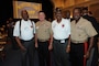 From left, J.T. Inge, U.S. Marine Lt. Gen. Terry Robling, the deputy commandant for aviation; Barnett Person; and Lt. Gen. Willie J. Williams, the director of Marine Corps Staff, pose for a photo during the breakfast in honor of Montford Marines at Crawford Hall at Marine Barracks Washington, Washington, D.C., Aug. 26, 2011.