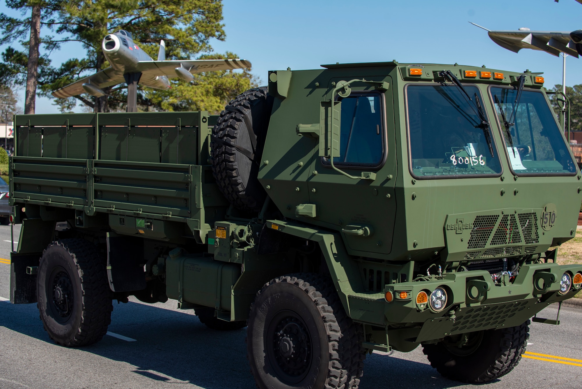An M1078 light medium tactical vehicle drives down the street during a Vehicle Inspection Roll-By competition at Seymour Johnson Air Force Base, North Carolina, March 8, 2021.