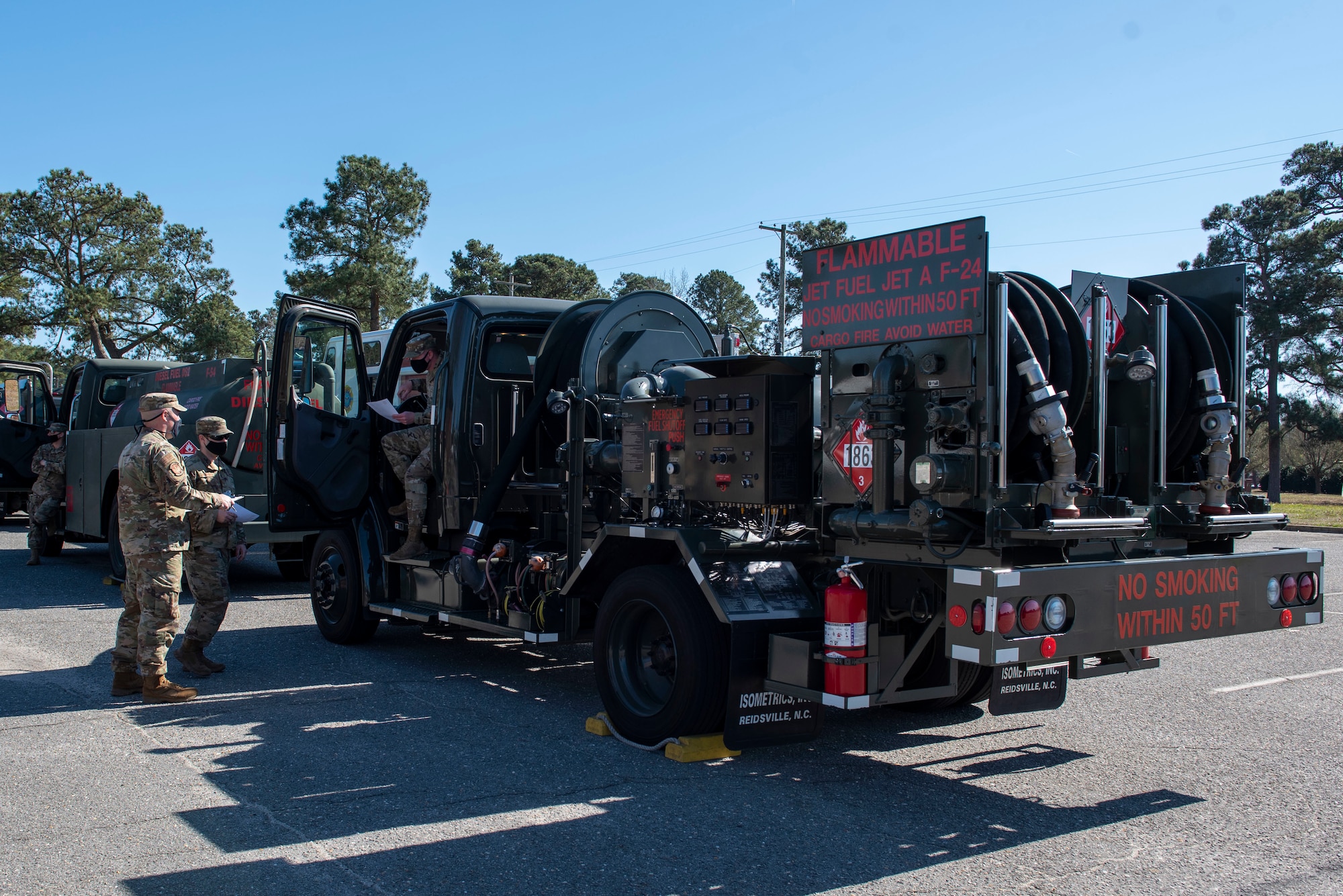 Airman from the 4th Logistics Readiness Squadron inspects an R-12 hydrant servicing truck during a Vehicle Inspection Roll-By competition at Seymour Johnson Air Force Base, North Carolina, March 8, 2021.