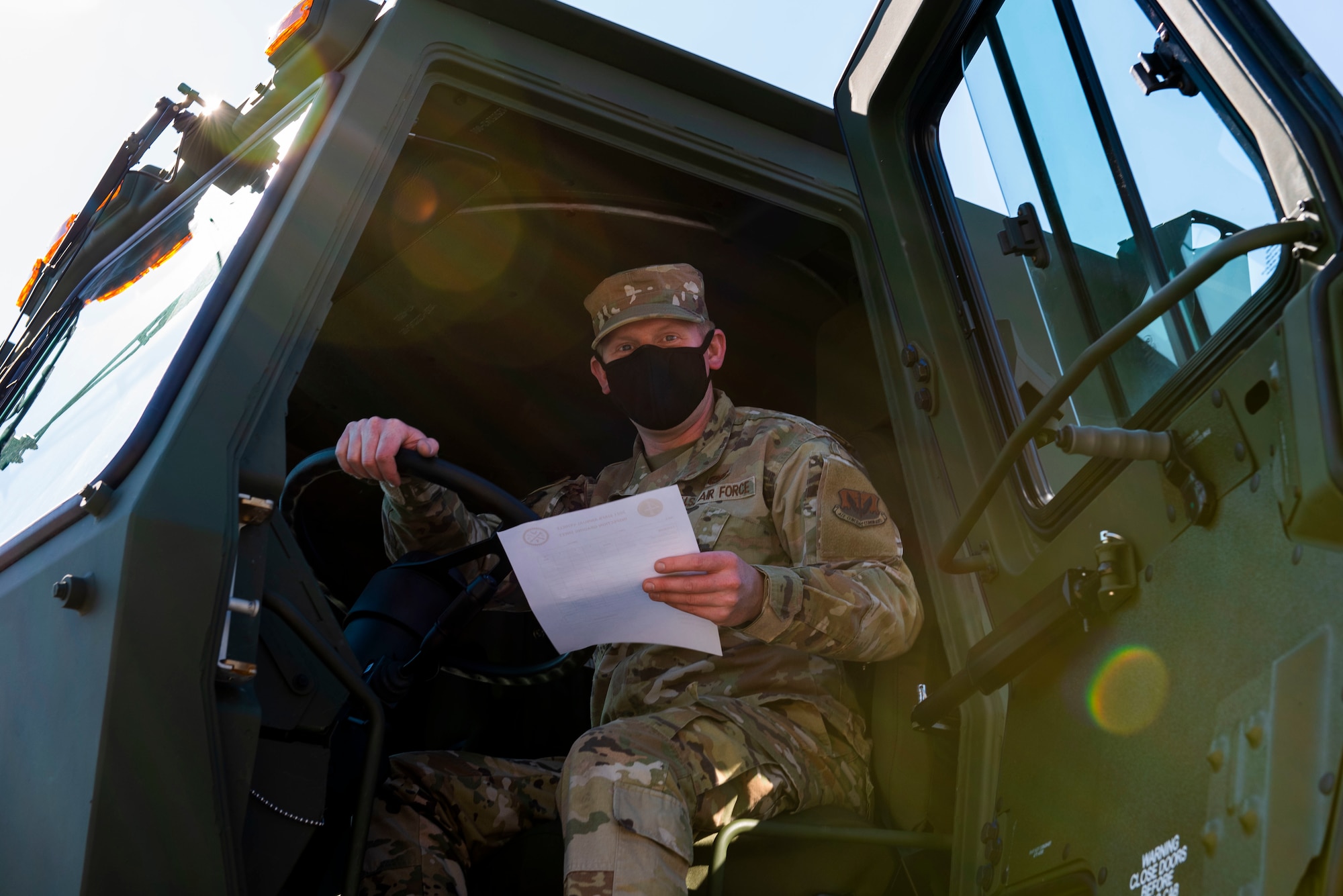 Airmen from the 4th Logistics Readiness Squadron grade a tractor during a Vehicle Inspection Roll-By competition at Seymour Johnson Air Force Base, North Carolina, March 8, 2021.