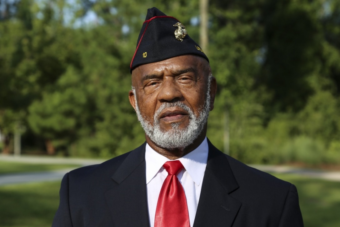 James L. Spann, a veteran that served at Montford Point, poses for a photo at the Montford Point Marines Memorial on Marine Corps Base Camp Lejeune, Aug. 22, 2019.