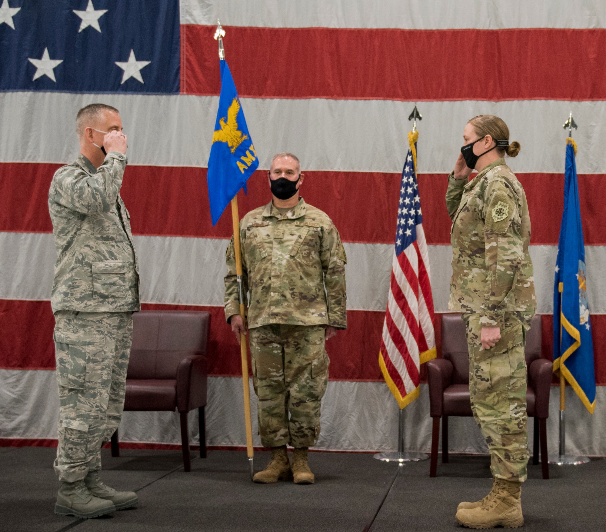 Maj. Katherine Schifani (right), the new 419th Aircraft Maintenance Squadron commander, salutes Col. Brett Newman, commander of the 419th Maintenance Group, during a change of command ceremony Mar. 7, 2021 at Hill Air Force Base, Utah.