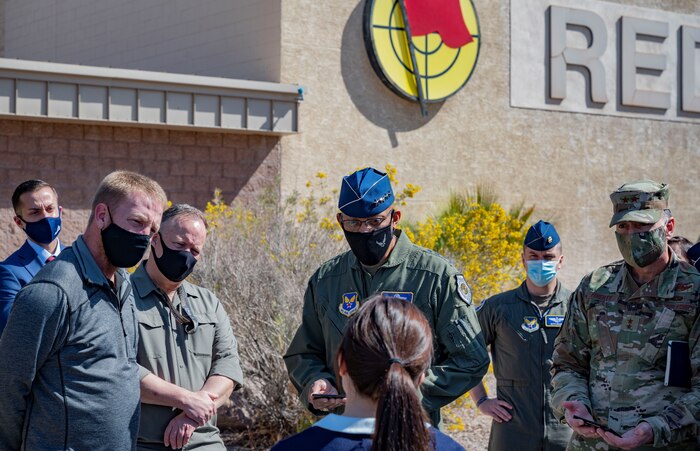 Gen. Brown is briefed on 5G capabilities.
