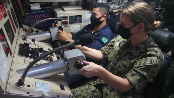 Lt. Taylor Butler, an Olmsted Scholar currently pursuing a Master’s degree in Brazil, executes a diving maneuver aboard the Brazilian Navy Submarine BNS Tupi (S30), March 4, 2021. Butler embarked on Tupi for four days at sea to help increase the exchange of knowledge between U.S. and Brazilian submarine forces. U.S. Naval Forces Southern Command/U.S. 4th Fleet supports USSOUTHCOM joint and combined military operations by employing maritime forces in cooperative maritime security operations in order to maintain access, enhance interoperability and build enduring partnerships that foster regional security and promote peace, stability and prosperity in the Caribbean, Central and South American regions. (Courtesy U.S. Navy photo/Released)