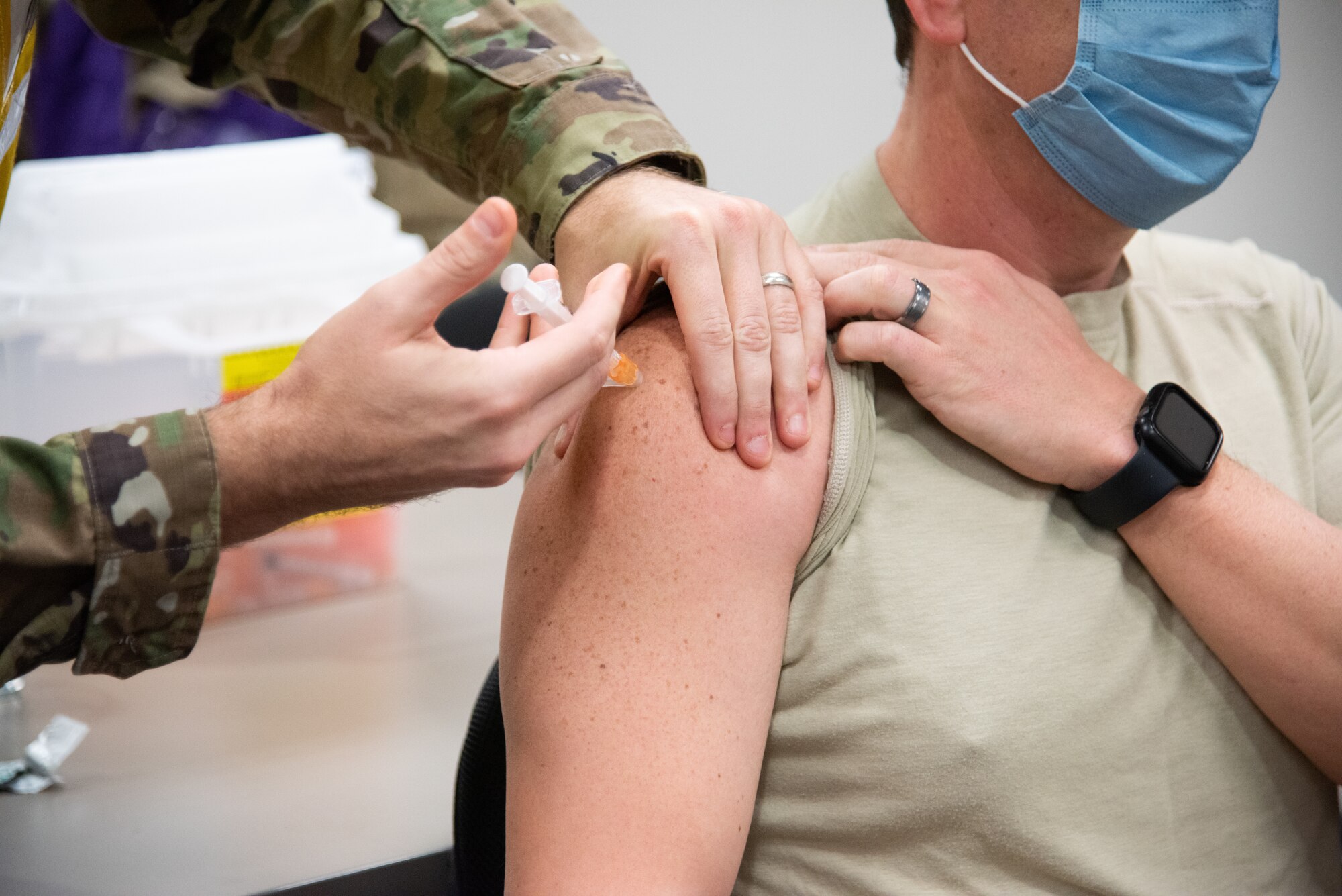 arm receiving vaccine shot