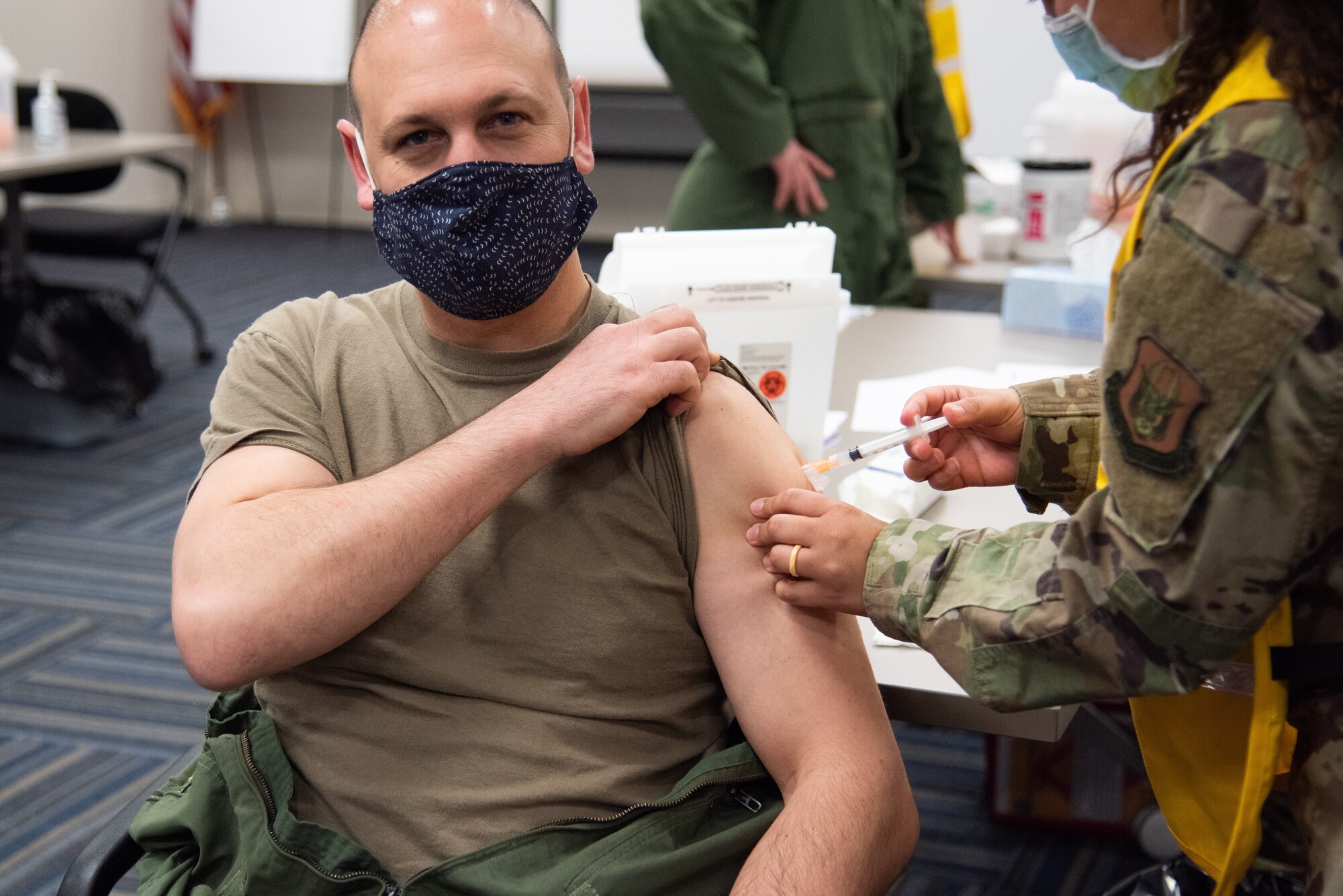 arm receiving vaccine shot