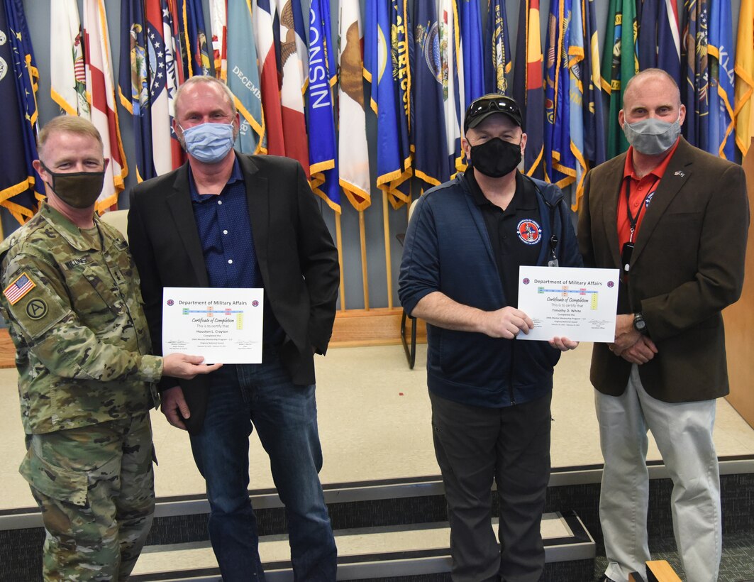 Participants in the Virginia Department of Military Affairs’ first-ever mentorship program graduate during a ceremony Feb. 25, 2021, at Fort Pickett, Virginia.