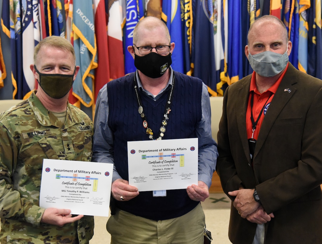 Participants in the Virginia Department of Military Affairs’ first-ever mentorship program graduate during a ceremony Feb. 25, 2021, at Fort Pickett, Virginia.