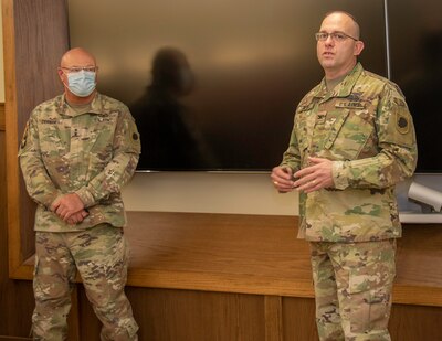 Newly promoted Col. Eric Davis, of Mount Pulaski, Illinois, addresses friends and family during his promotion ceremony at Camp Lincoln in Springfield, Illinois Dec. 29.