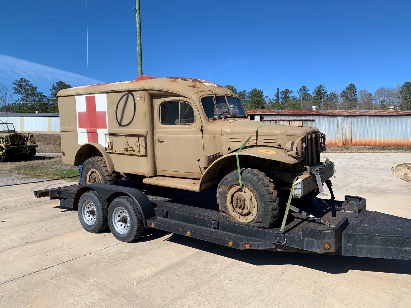 A World War II ambulance sits on a trailer at the Army Museum Support Center’s outdoor storage facility at Anniston, Alabama, Jan. 28 awaiting transport to the Alabama Center of Military History.