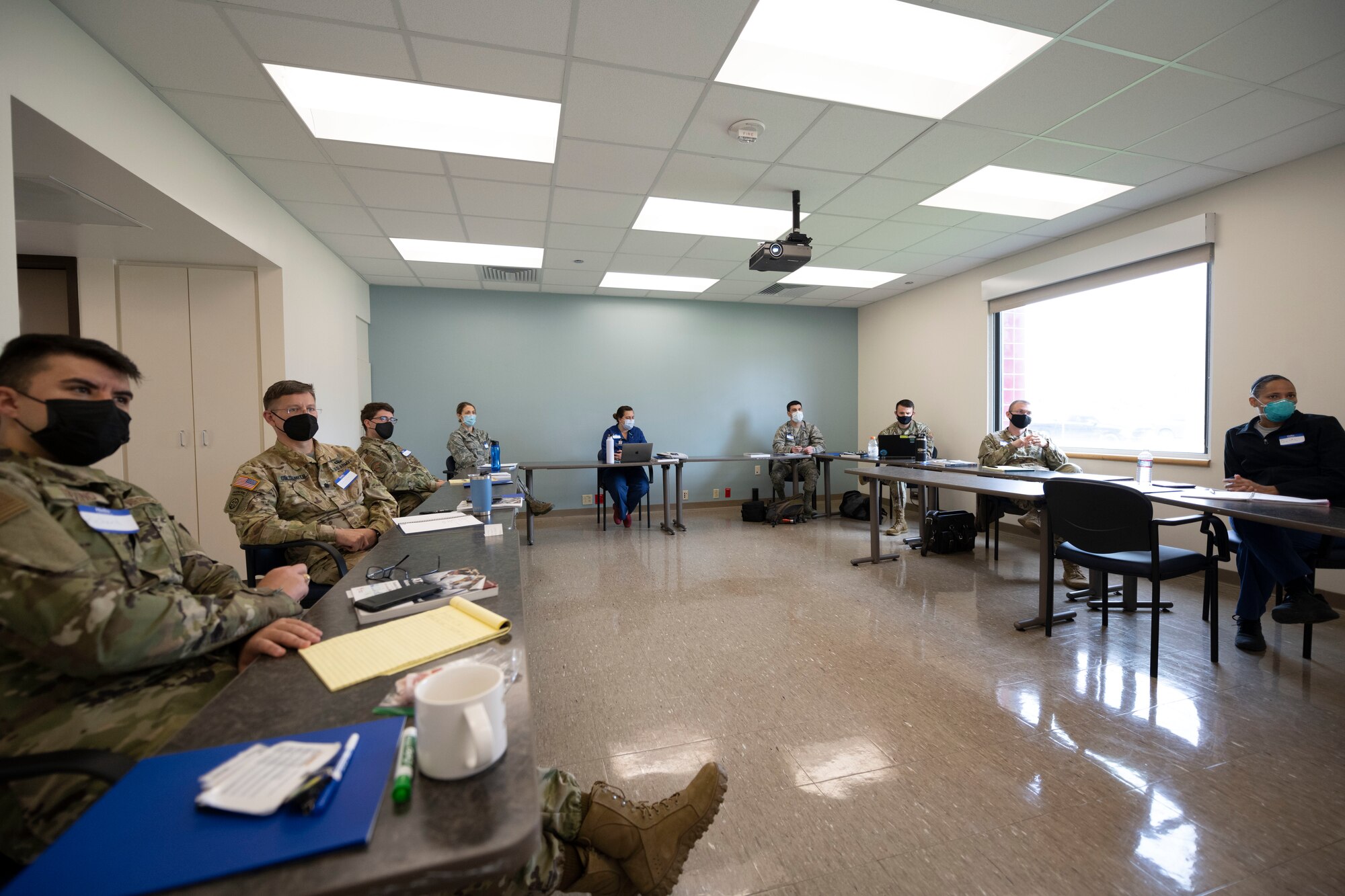 U.S. service members sit in a classroom during an Advanced Trauma Life Support course March 3, 2021, Travis Air Force Base, California. Nine service members participated in the ATLS training course at David Grant USAF Medical Center. ATLS equips different specialties in the medical field with the skills to treat traumatic injuries. (U.S. Air Force photo by Airman 1st Class Alexander Merchak)