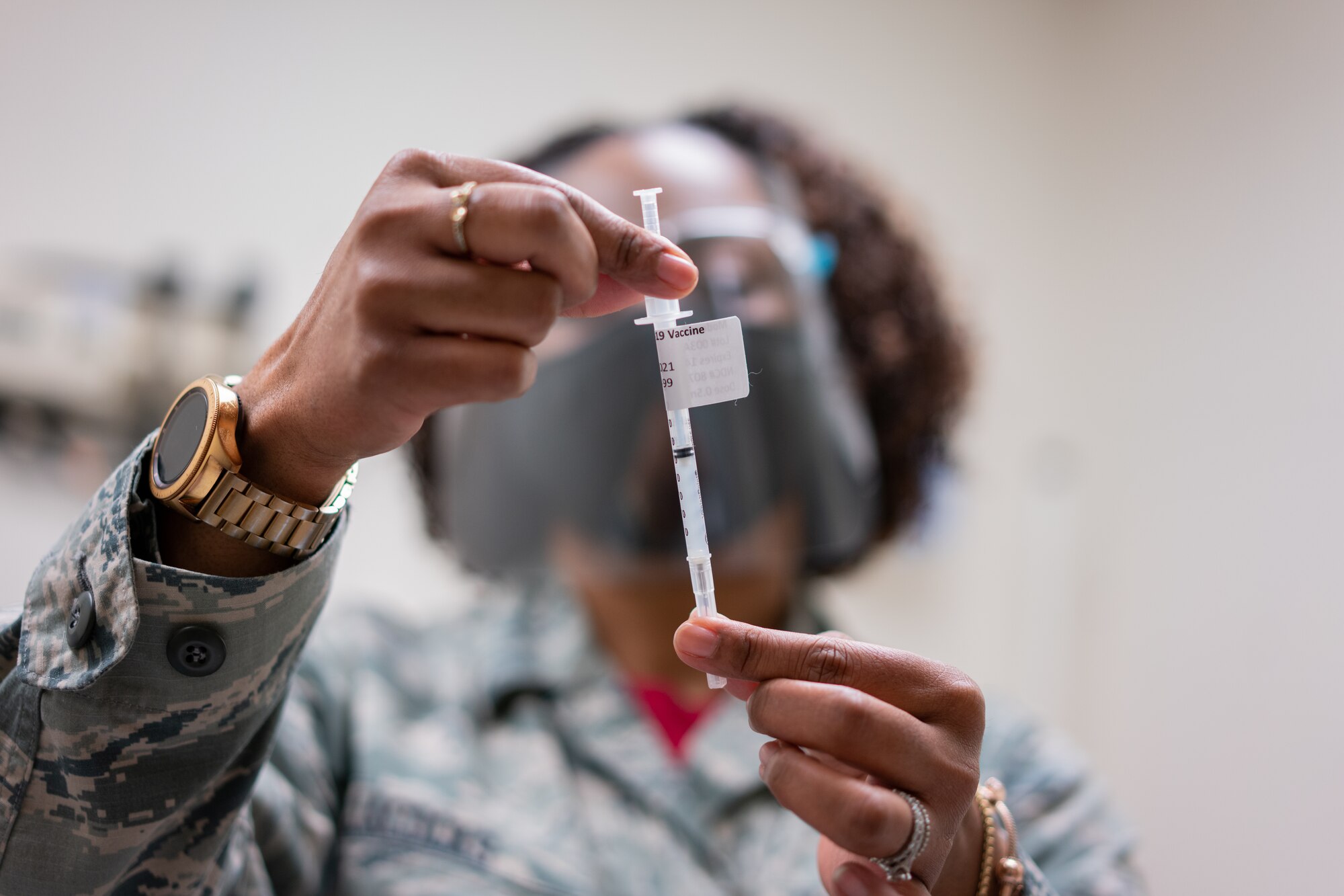413th ASTS administers COVID-19 vaccine