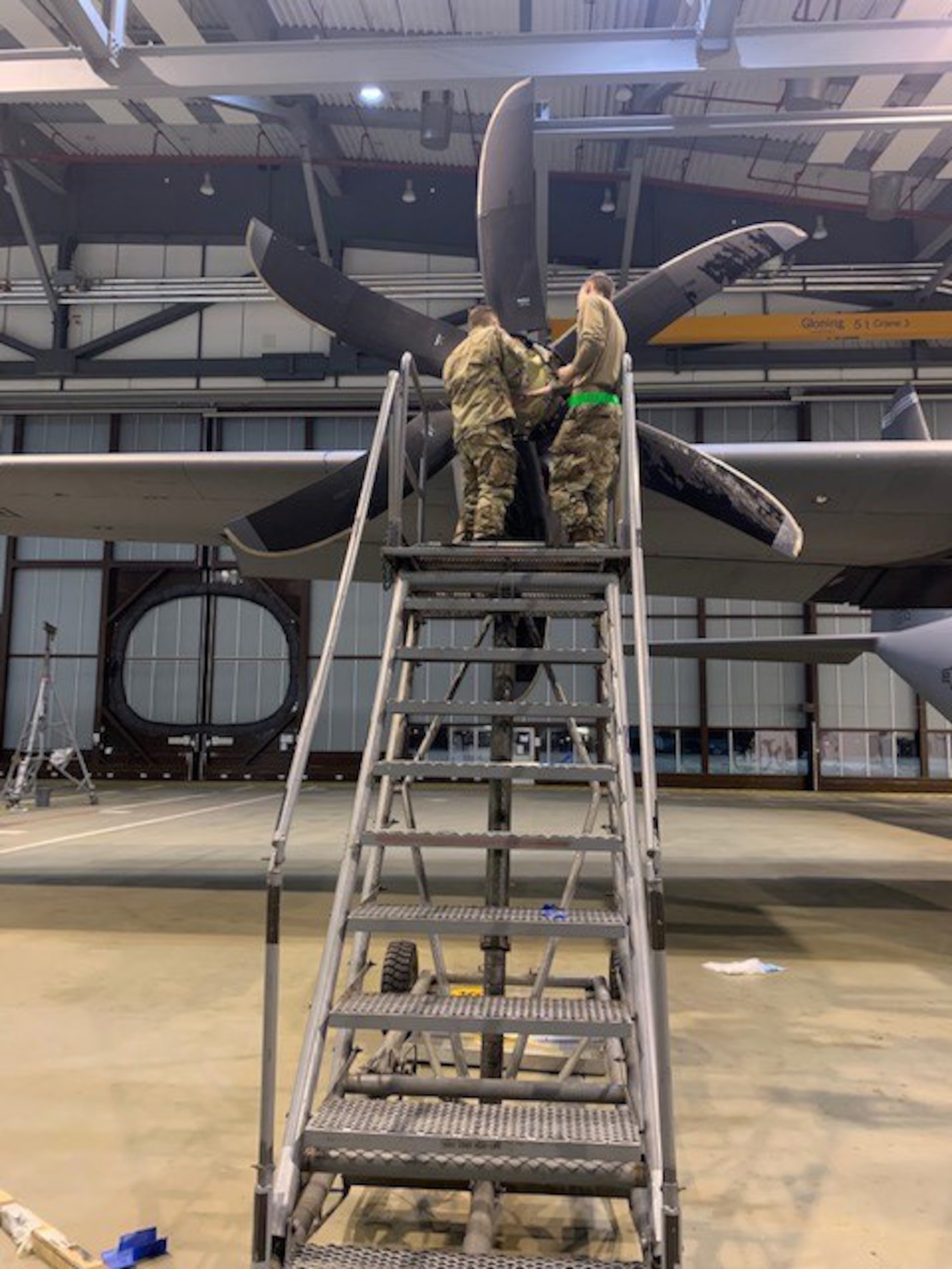 U.S. Air Force Airmen assigned to the 86th Maintenance Squadron and the 86th Aircraft Maintenance Squadron inspect a C-130J Super Hercules aircraft propeller during maintenance procedures