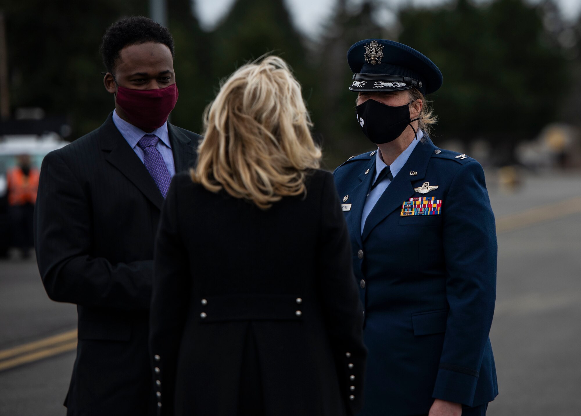 First Lady Dr. Jill Biden is greeted by U.S. Air Force Col. Erin Staine-Pyne, commander of the 62nd Airlift Wing, and her spouse, Frank Staine-Pyne, at Joint Base Lewis-McChord, Washington, March 8, 2021. Biden visited with military families as part of an on-going effort to relaunch Joining Forces, an initiative to support service members, veterans and their families through wellness, education, and employment opportunities. (U.S. Air Force photo by Staff Sgt. Rachel Williams)